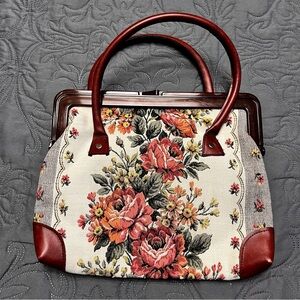 Unbranded floral clutch handbag with kiss closure and handles